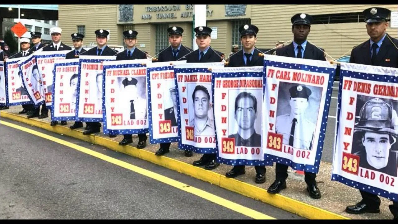 FDNY firefighters honoring a fallen hero at a memorial
